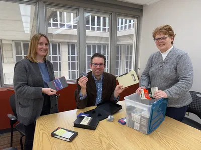 WCFTR Staff Examining Tapes